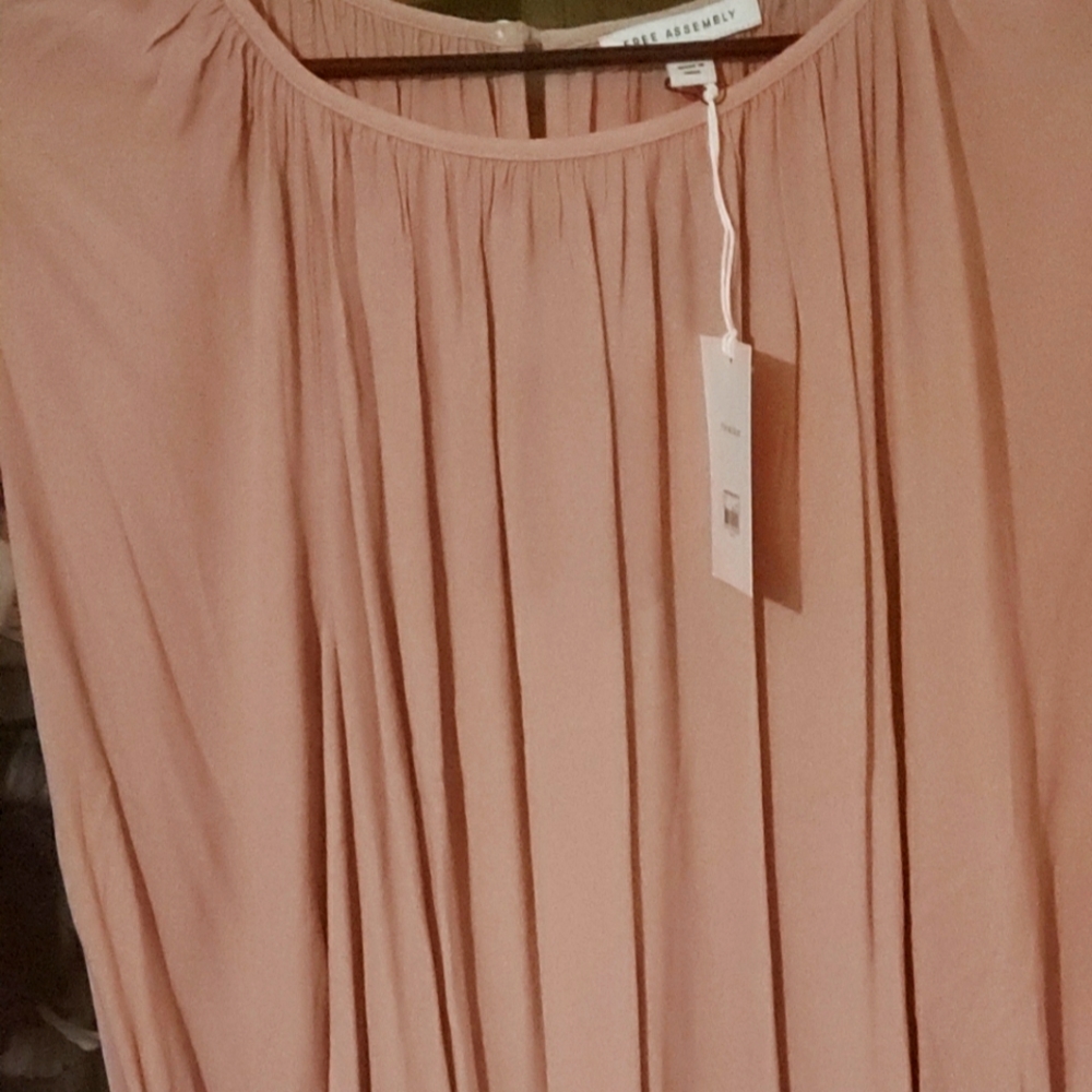 Woman's Size Large  Rose color Long sleeve Blouse. Tags still on never worn.